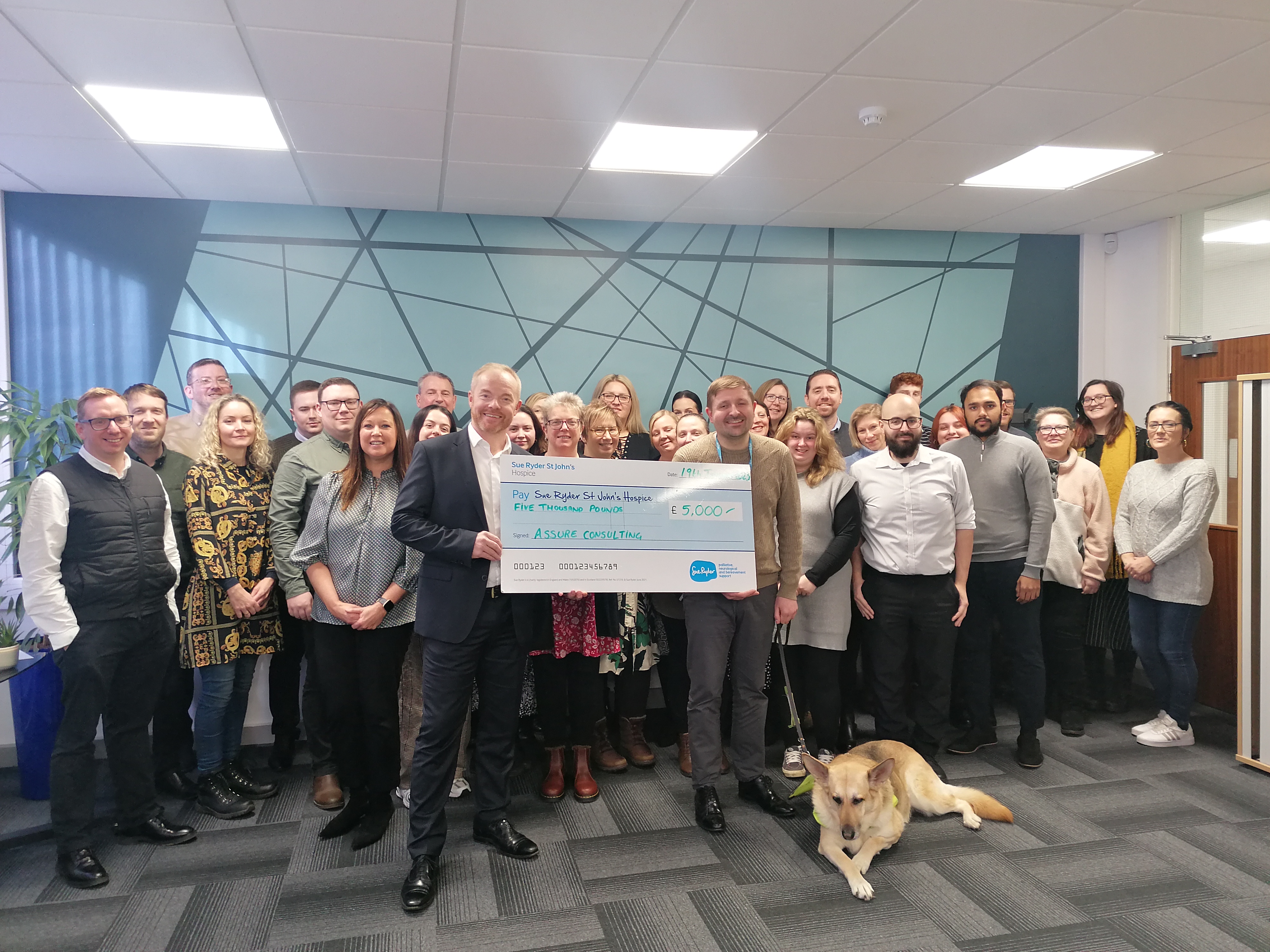 Bedford business raises thousands for Sue Ryder through a series of charity challenges